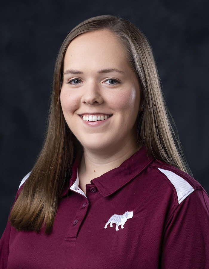 Formal studio headshot portrait of Emily Grace McCall