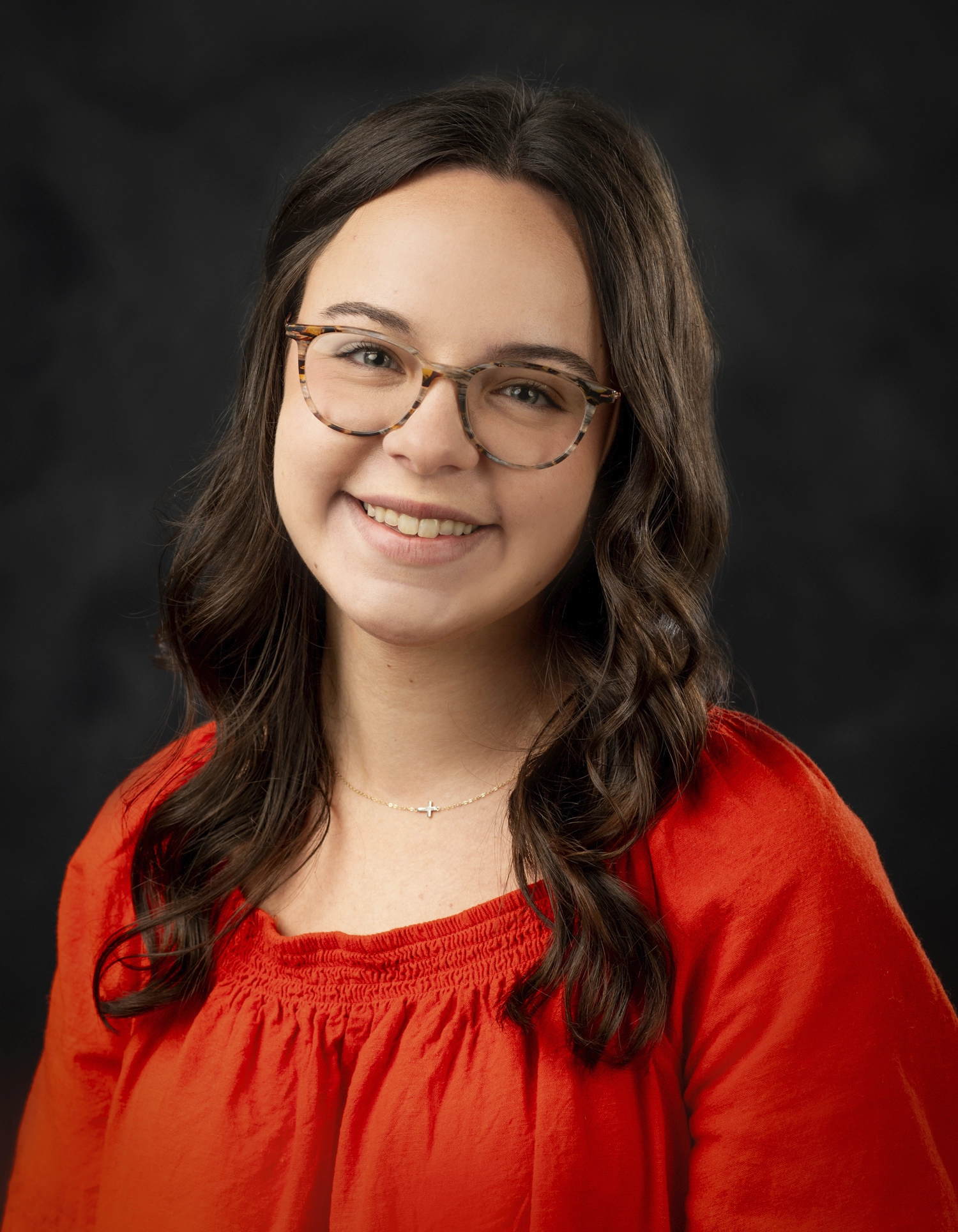 Formal studio headshot portrait of Sarah Triplett